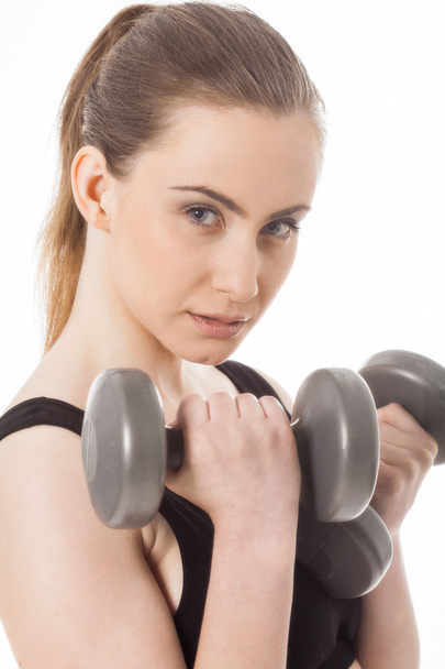 Sporty woman with dumbbells - Foto, immagini