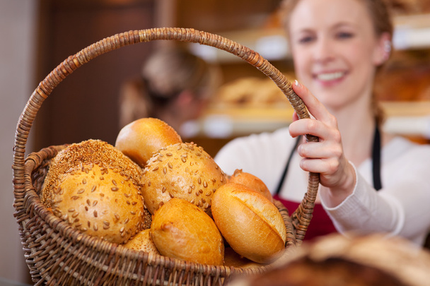 Bakery Worker Holding Bread Basket - Фото, изображение