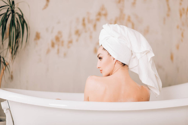 Beautiful sexy woman in bubble bathtub - Zdjęcie, obraz