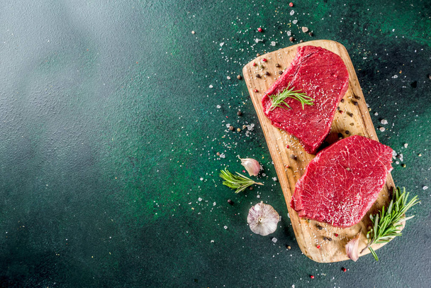 Raw beef meat steaks with spices - Photo, Image