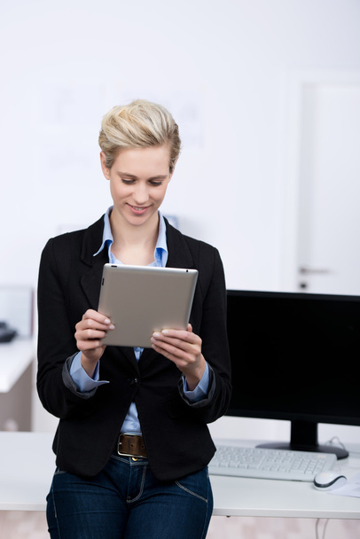 Young Businesswoman Holding Digital Tablet In Office - Foto, Imagem
