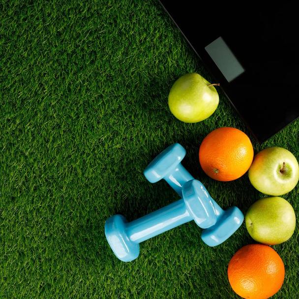 Sport equipment. Creative flat lay of sport and fitness equipmen - Фото, изображение