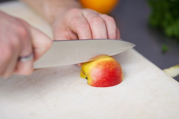 man cutting apple - Fotó, kép