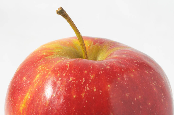 One Juicy Hot Red Apple over a White Background - Foto, Bild