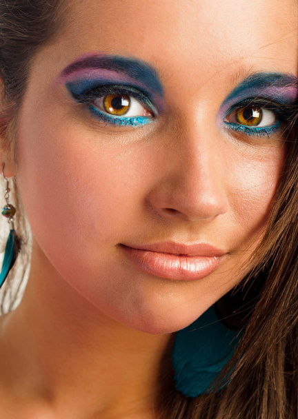Closeup photo of a girl with beautiful makeup - Фото, изображение