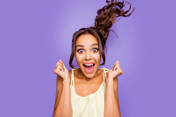 Close-up photo portrait of cool in summer casual clothing astonished delightful she her lady raising hands fists up wants to go shopping sale season isolated violet background - 写真・画像