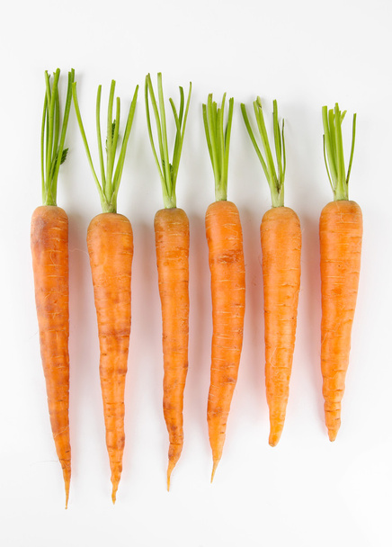 Carrots, isolated on white - Фото, изображение