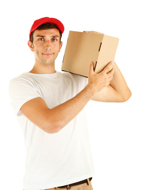 Young delivery man holding parcel, isolated on white - Foto, imagen