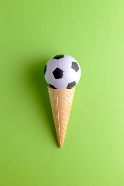 Ice cream cornet with soccer ball - Photo, image