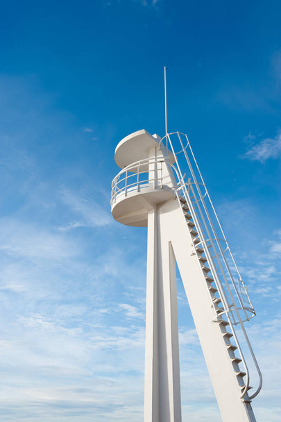 A lifeguard watchtower against sunny sky background - Foto, Imagen