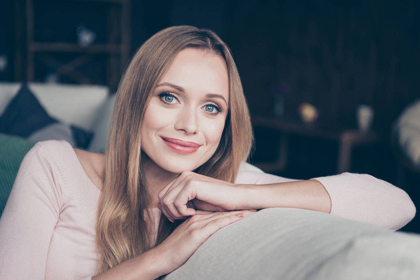Closeup photo portrait of calm pretty she her lady with perfect ideal pomade lips lipstick leaning on hands looking at camera sitting on white beige divan - Foto, Bild