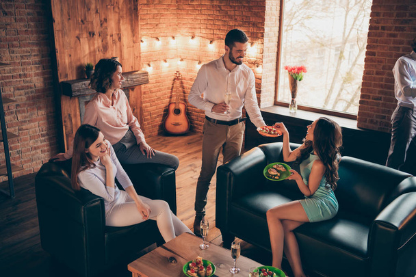 Close up photo event company buddies hang out rest eating treatment she her ladies he him his guys wineglasses golden wine beverage wear dresses shirts formalwear sit comfort sofa loft room indoors - Foto, Imagem