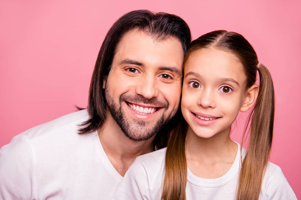 Close up photo beautiful she her little small lady he him his father toothy smile pretty appearance long hairdo hairstyle wear casual white t-shirts denim jeans isolated pink bright background - Fotó, kép
