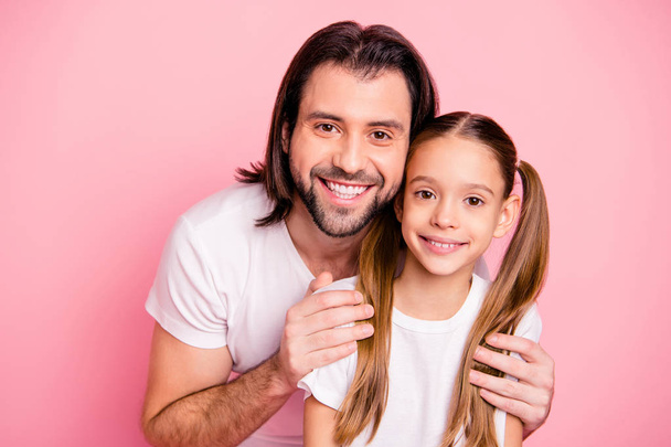 Close up photo beautiful she her little small lady he him his father toothy smile pretty appearance long hairdo hairstyle wear casual white t-shirts denim jeans isolated pink bright background - Zdjęcie, obraz