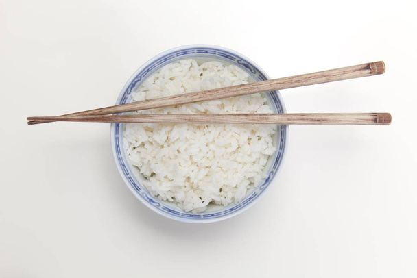 Bowl of white rice isolated on white - Fotoğraf, Görsel