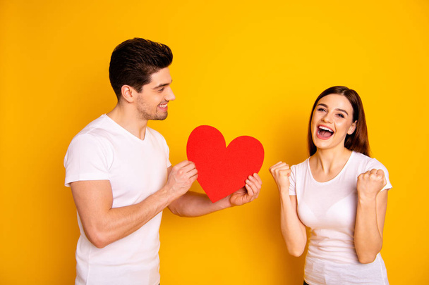 Close up side profile photo beautiful she her he him his guy lady scream shout yell positive answer fiance bride hands arms heart figure postcard wear casual white t-shirts isolated yellow background - Fotografie, Obrázek