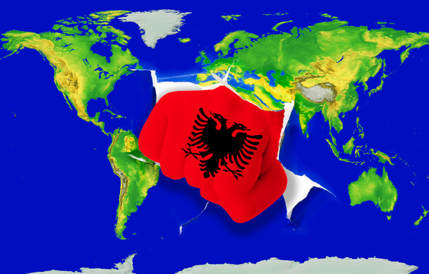 Punho na cor bandeira nacional de albania perfurando mapa do mundo
 - Foto, Imagem
