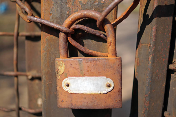 Rusty padlock on rusty chain - Photo, Image