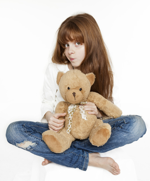 Red-haired teen girl and teddy bear - Zdjęcie, obraz
