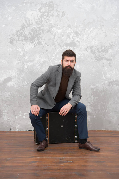 Hipster traveler with baggage. Ready for relocation with baggage. Start journey. On way to new life. Man well groomed bearded hipster big suitcase. Travel and relocation. Travel and baggage concept - Photo, image