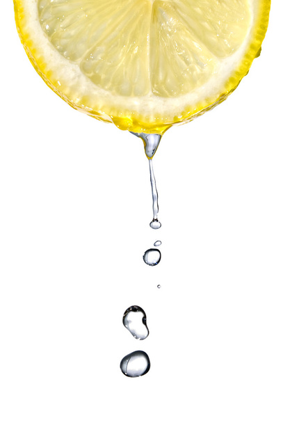 Fresh lemon slice with water drops - Photo, image
