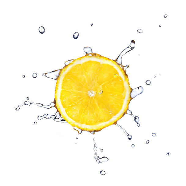 Slice of lemon with water drops - Foto, Imagem