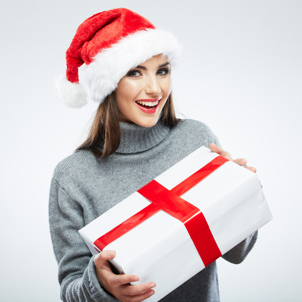 Christmas Santa hat isolated woman portrait hold christmas gift. - Fotografie, Obrázek