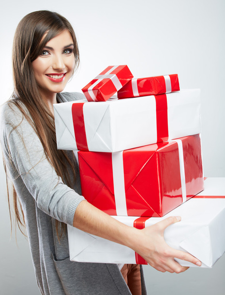 Young woman portrait hold many gift in christmas color style . - Foto, imagen