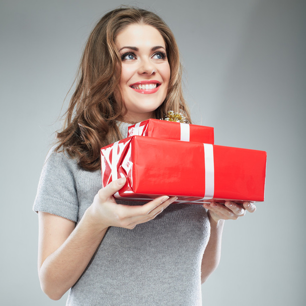 Young woman hold gift box . - Zdjęcie, obraz