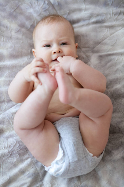 Portrait of a cute 6 months old baby - Foto, Imagen