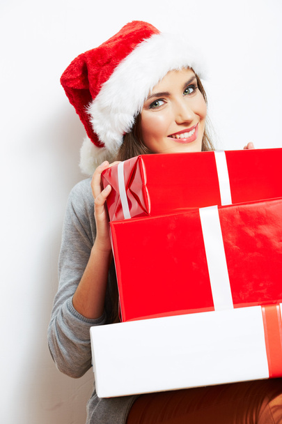 Christmas Santa hat isolated woman portrait hold christmas gift. - Foto, Imagem