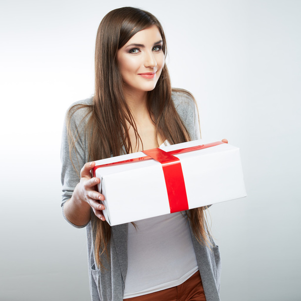 Young woman portrait hold gift in christmas color style - Фото, зображення