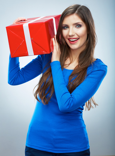 Young happy smiling woman hold red gift box - Fotografie, Obrázek