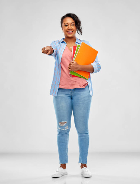 african american student woman with notebooks - 写真・画像