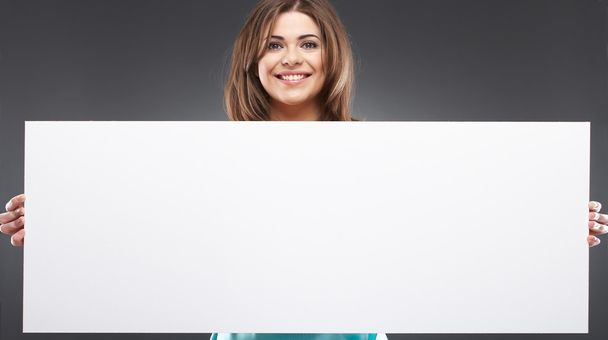 woman with blank white board - Foto, afbeelding