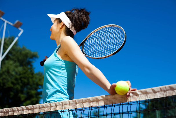Girl Playing Tennis, summertime saturated theme - Фото, зображення