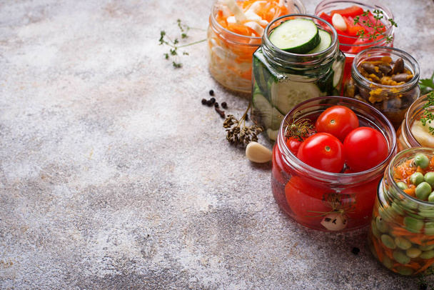 Fermented food. Preserved vegetables in jars - Photo, Image