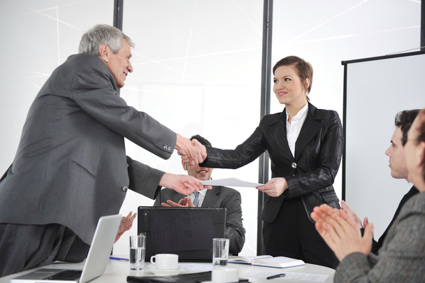 Happy business leaders handshaking at meeting - Photo, Image