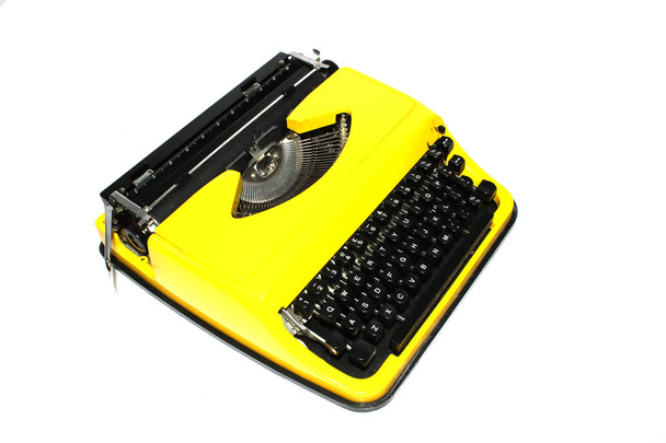 Retro Yellow Typewriter on a White Background - Photo, Image