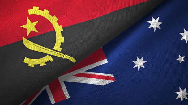 Angola en Australië twee vlaggen textiel doek, weefsel textuur  - Foto, afbeelding