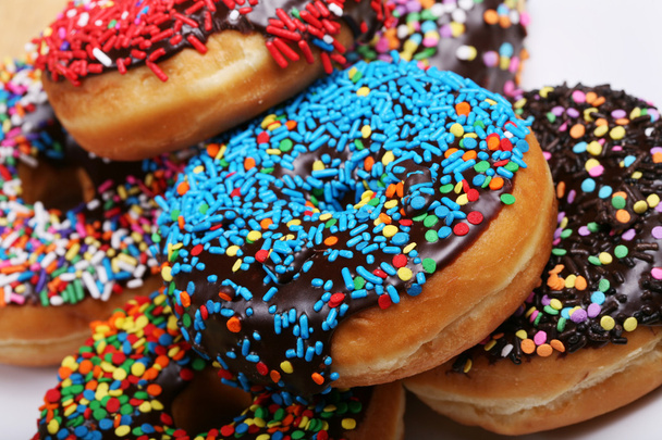 Colorful donuts on plate - Foto, imagen