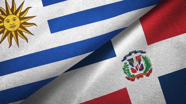 Uruguay y República Dominicana dos banderas tela textil, textura de la tela
 - Foto, Imagen
