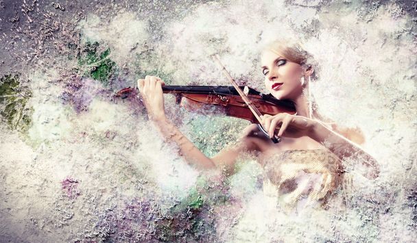 Gorgeous woman playing violin - Photo, Image