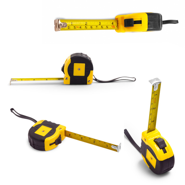 Conjunto de fita métrica isolada ferramenta branca medidor de construção amarelo c
 - Foto, Imagem