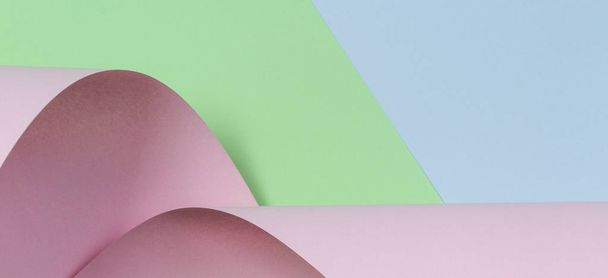 Abstraktní pozadí. Pastelově růžový, zelený, modrý barevný papír v geometrických tvarech - Fotografie, Obrázek