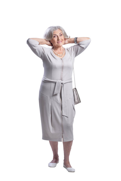 portrait of beautiful senior woman posing  against white background - Fotó, kép