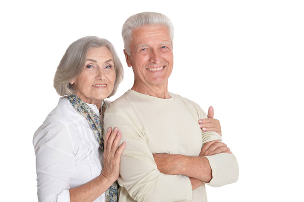 Portrait of happy senior couple posing  isolated on white background - Fotó, kép