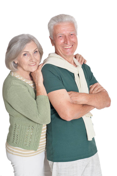 Portrait of happy senior couple embracing isolated on white background - Foto, Bild