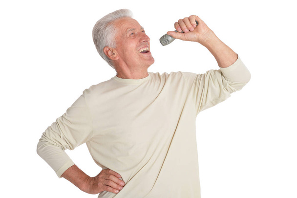 Senior man  singing into microphone  - Фото, зображення