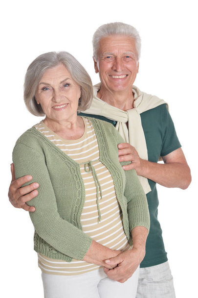 Portrait of happy senior couple embracing isolated on white background - Photo, Image